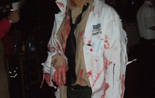 Man dressed as a zombie for Halloween.