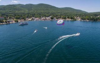 Para-glider over Lake George near town.