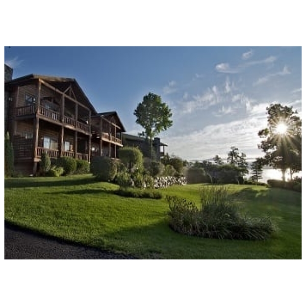 A stunning wide angle shot of the Lodges at Cresthaven during an Adirondacks summer.