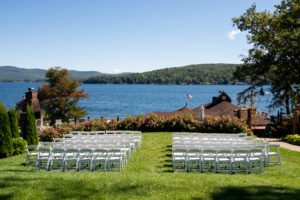 Lakeside wedding ceremony setup.