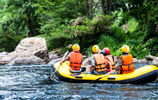 Photo of a group white water rafting in Lake George