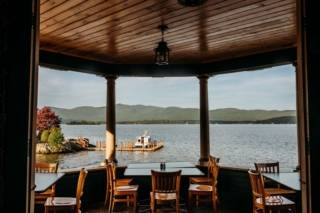 View of table and chairs overlooking the water at our Lake George waterfront restaurant