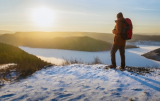 Person on Lake George, New York, hiking trail in winter