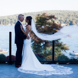 Bride and Groom embracing and overlooking Lake George